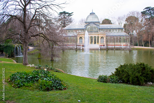 The Palacio de Cristal. "Crystal Palace" is a glass and metal structure located in Madrid's Buen Retiro Park, Spain.