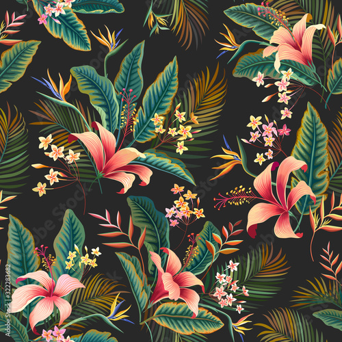 seamless floral pattern. tropical floral tropical pattern with hibiscus and palm tree leaves on dark background