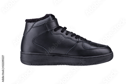 Black high boot on a white background. Winter sneakers.
