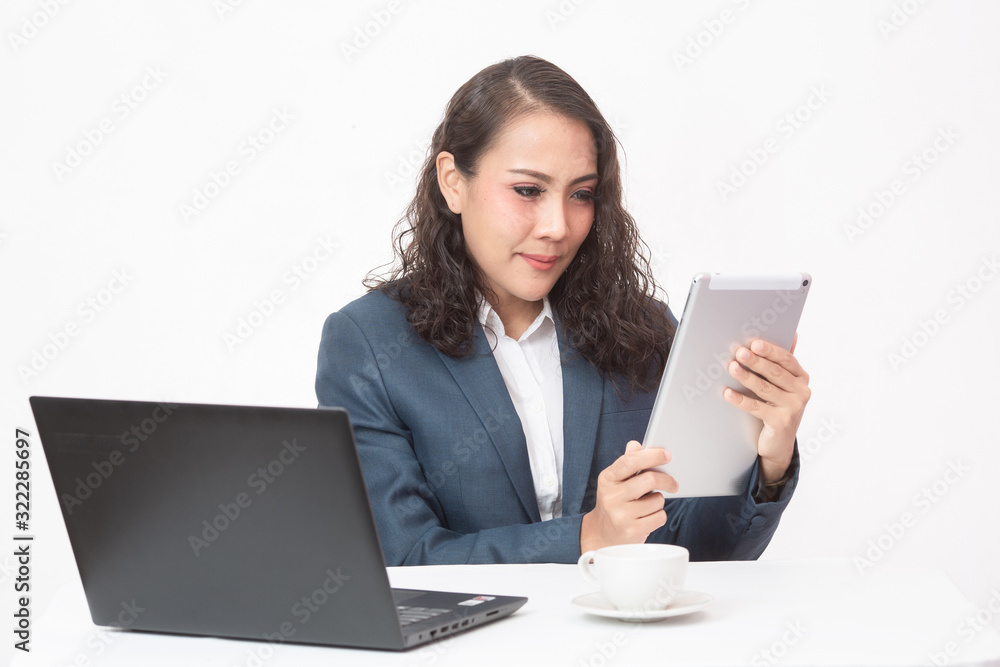 Beautiful young executive with her work and coffee Beautiful young executive with her work and coffee