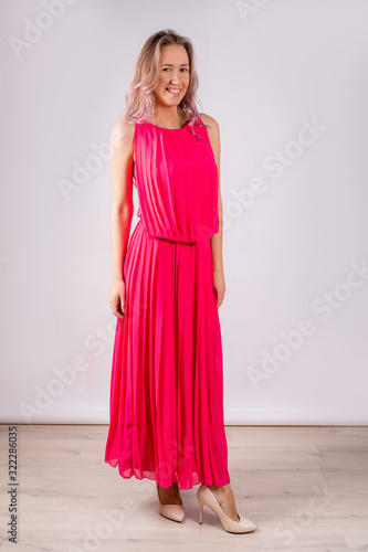 Wallpaper Mural Girl in pink dress isolated on white background. Torontodigital.ca