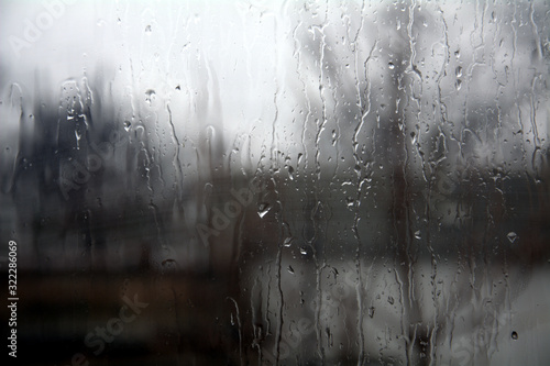 for the background, streams of raindrops on the window pane