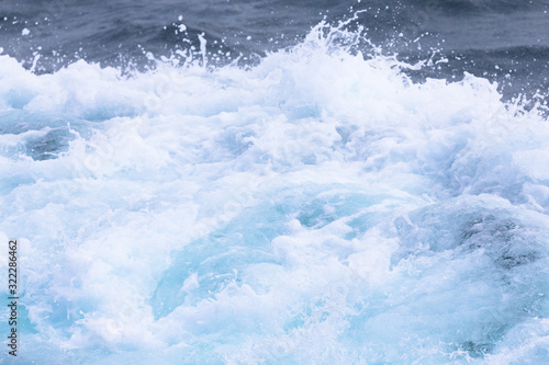 White crest of a sea wave. Selective focus. Shallow depth of field © strannik_fox