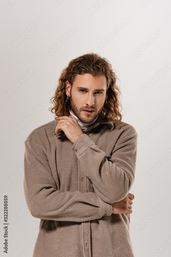 handsome man in shirt looking at camera isolated on white handsome man in shirt looking at camera isolated on white