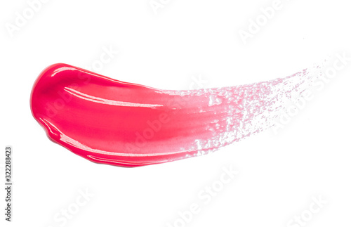 Lip gloss swatch pink red color smudge sample isolated on white background