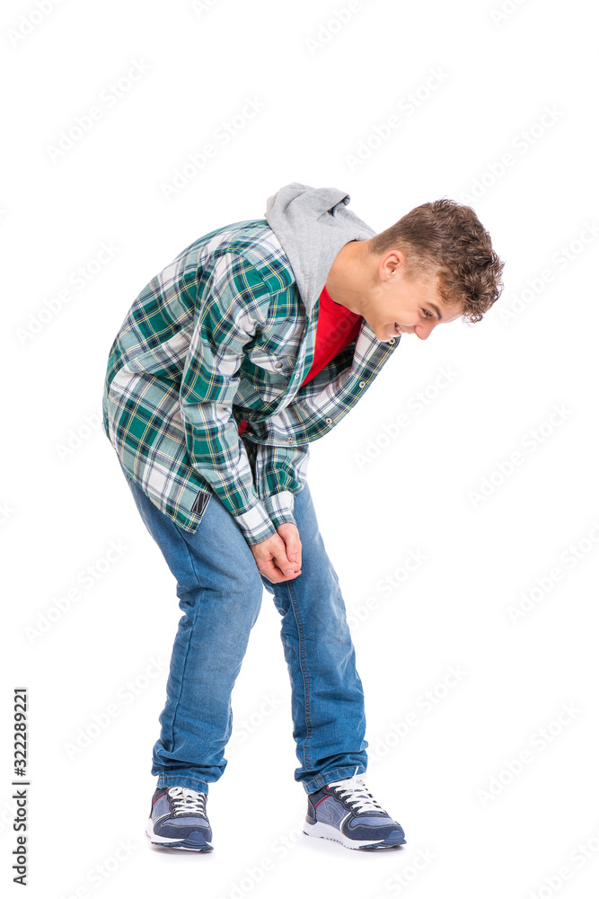 Full length emotional portrait of young caucasian teen boy isolated on white background. Funny handsome teenager laughing - have fun. Full length emotional portrait of young caucasian teen boy isolated on white background. Funny handsome teenager laughing - have fun.