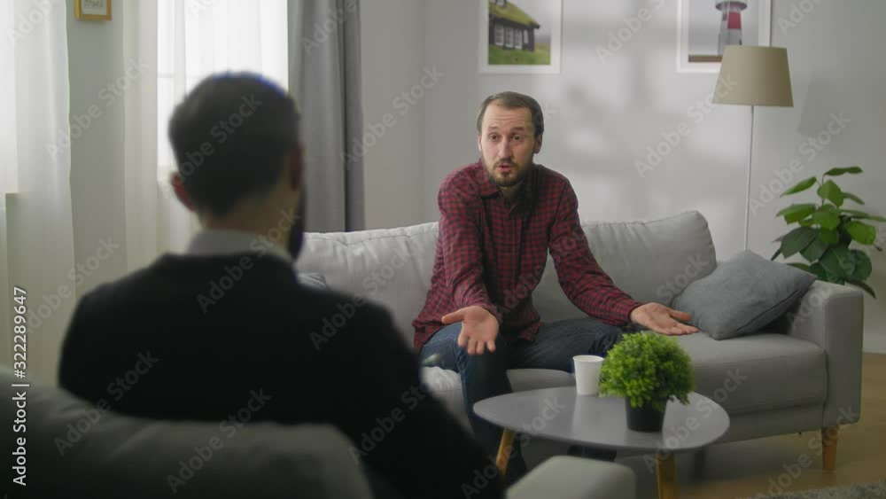 sad young man in Therapy session - Help, support, medical sad young man in Therapy session - Help, support, medical