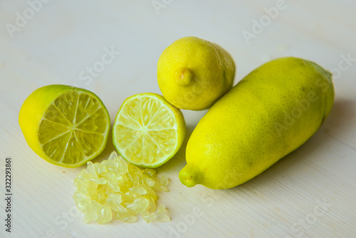 finger lime on a white cutting board photo