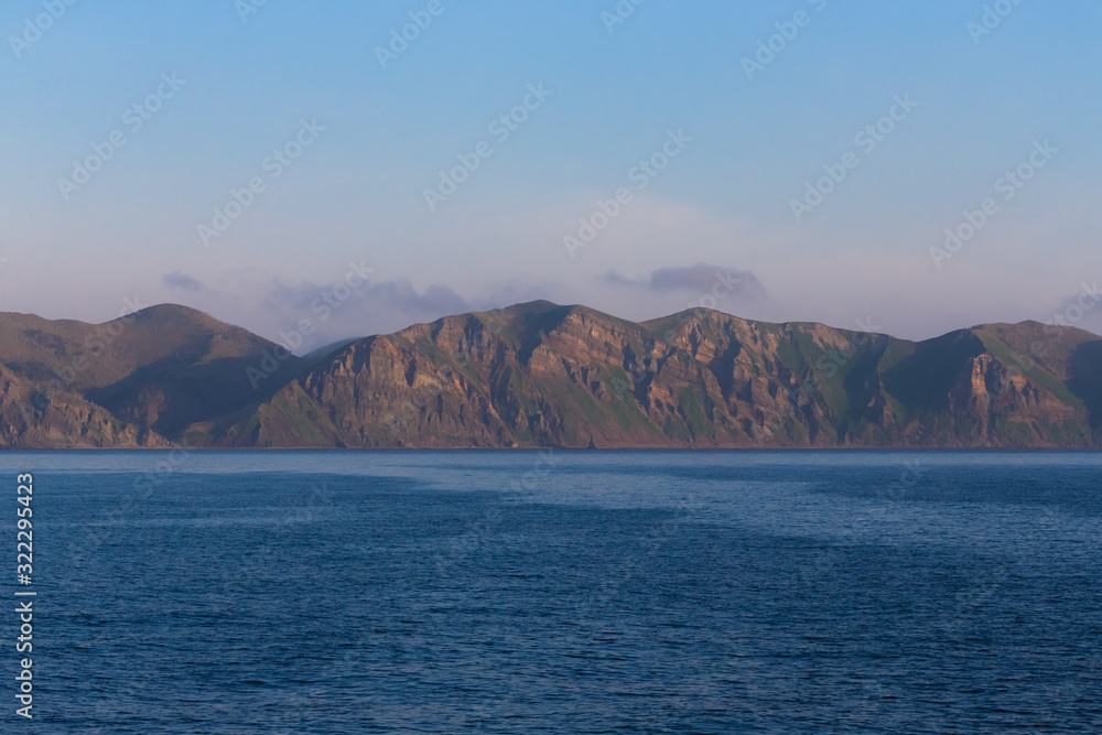 View on a Kunashir island with volcano Tyatya from the sea