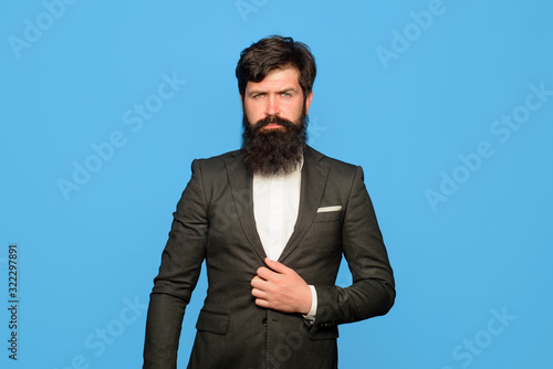 Serious confident businessman. Executive business man at workspace. Handsome leader CEO boss portrait. Serious businessman in suit. Businessman in stylish clothes. Business, people and office concept.