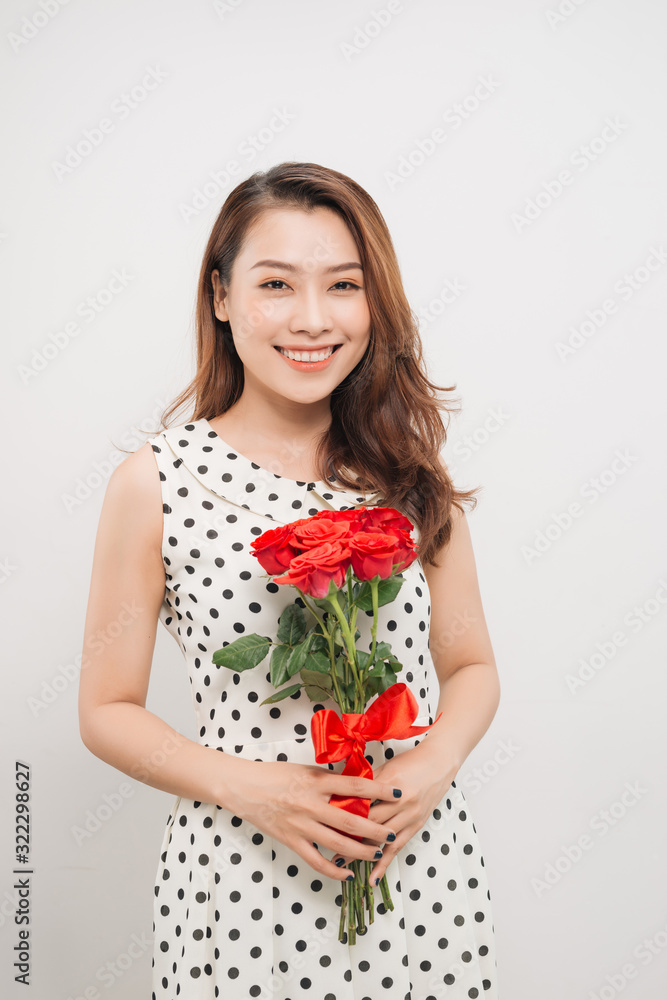 Is it for me. Waist up portrait of joyful young lady receiving red rose