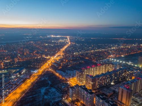 Aerial drone view. Evening illumination of the snowy city of Kiev. © Sergey