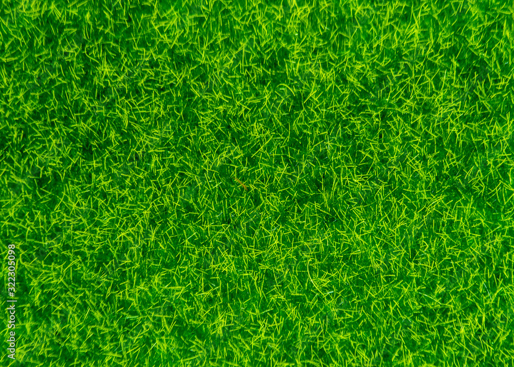 Close up of artificial green grass background Close up of artificial green grass background