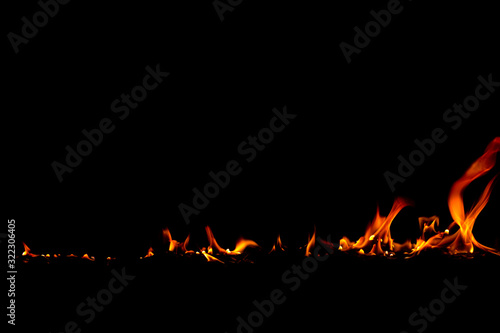 On fire flames at the black background