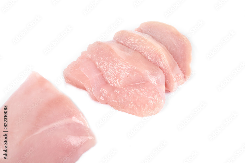 Raw chicken fillet and slices of chicken fillet isolated on white. Raw chicken fillet and slices of chicken fillet isolated on white.