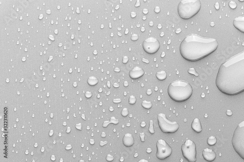 Drops of water on a color background.