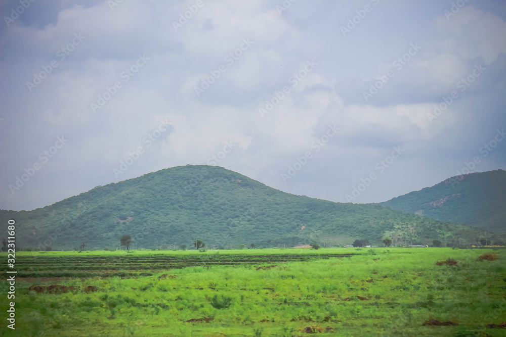 landscape with mountains and clouds