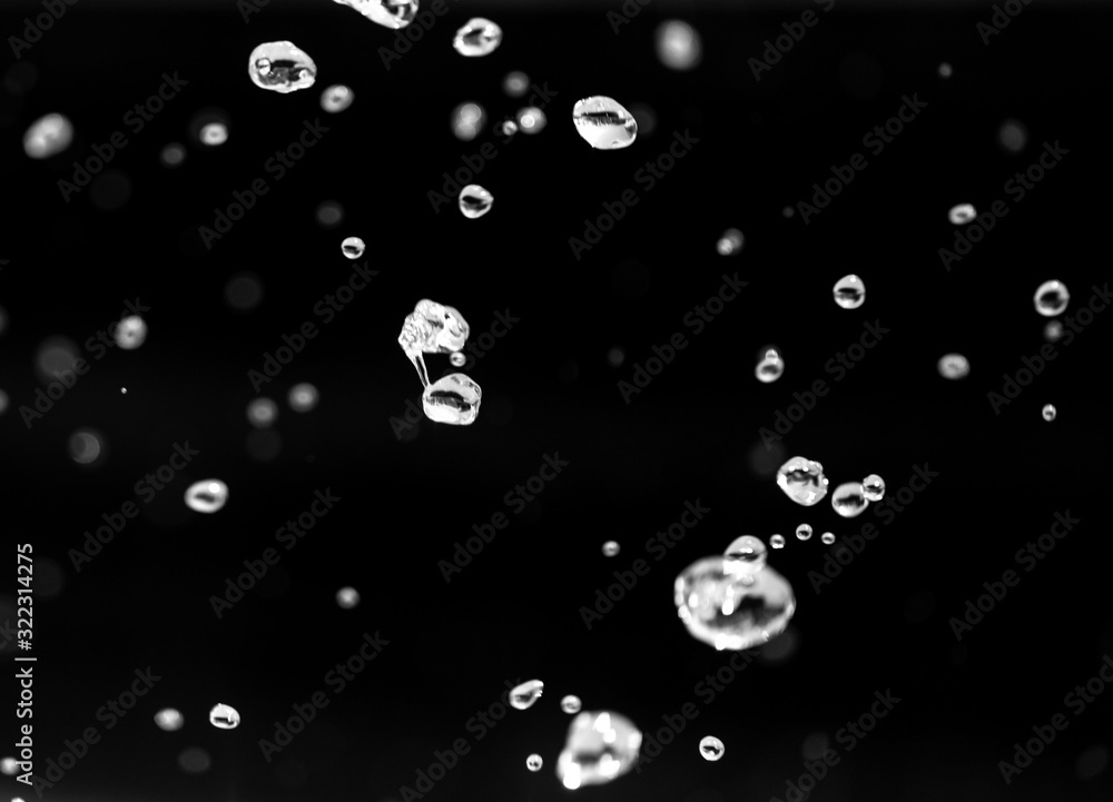 Water splashing from a fountain on summer nature Water splashing from a fountain on summer nature