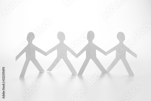human chain paper doll on white