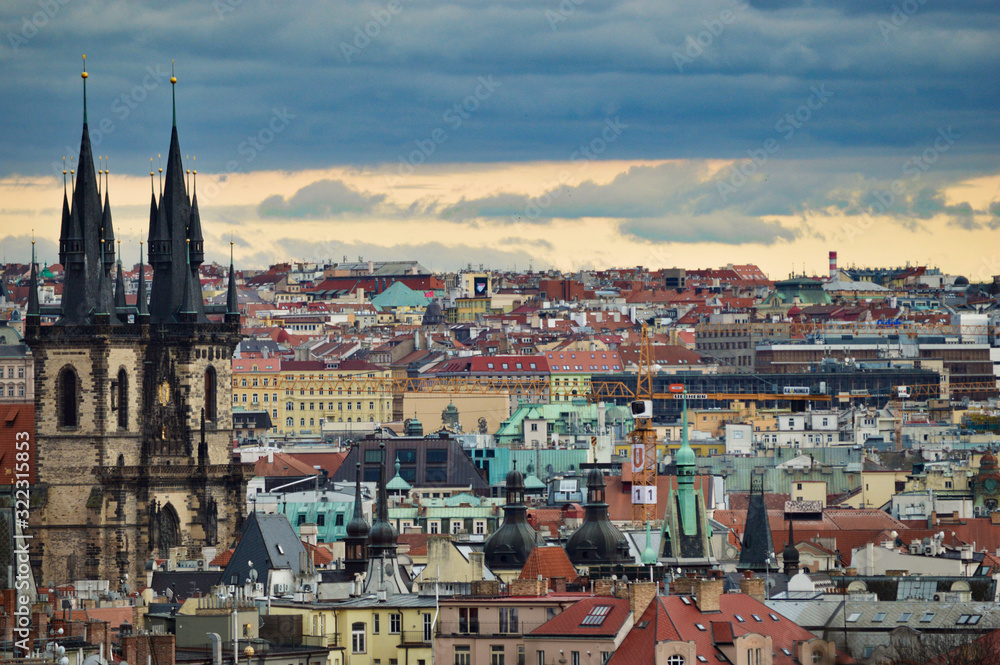 Beautiful view from the park at Prague streets, old historical buildings and rooftops