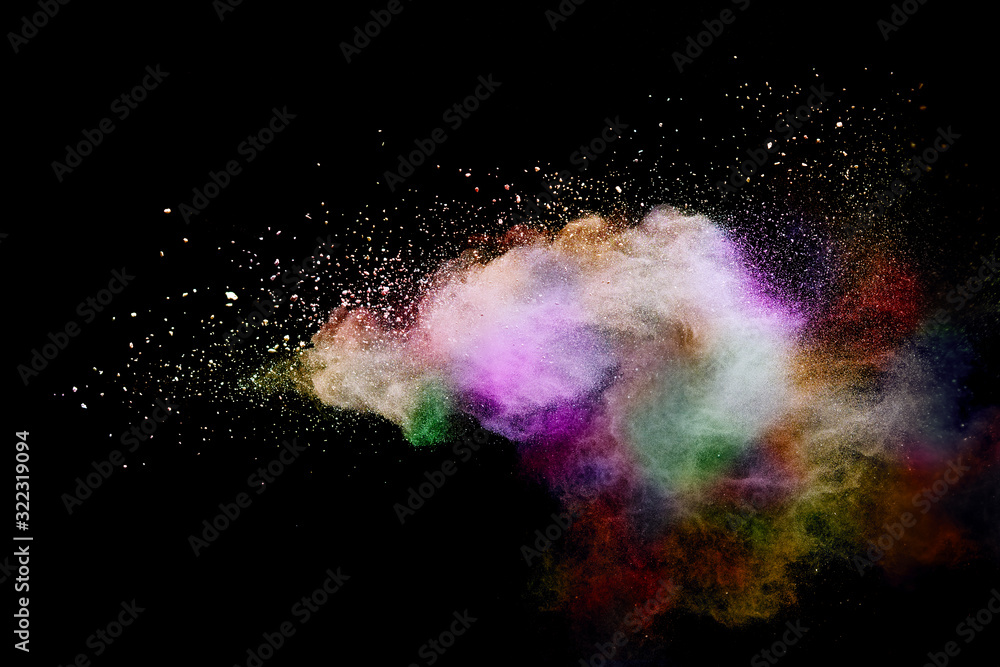 Fototapeta Abstract powder splatted background. Colorful powder explosion on black background. Colored cloud. Colorful dust explode. Paint Holi.