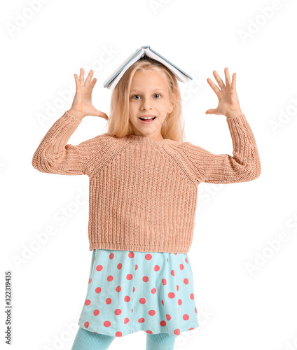 Little girl with book on wh...
