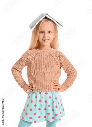 Little girl with book on wh...