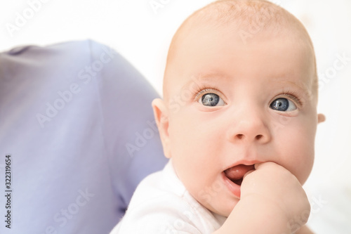 Cute Baby with Blue Eyes an...