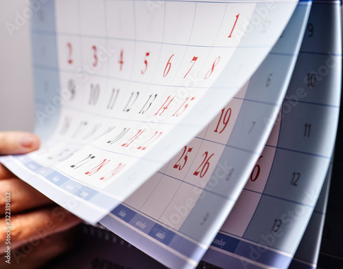 calendar with hand and fan