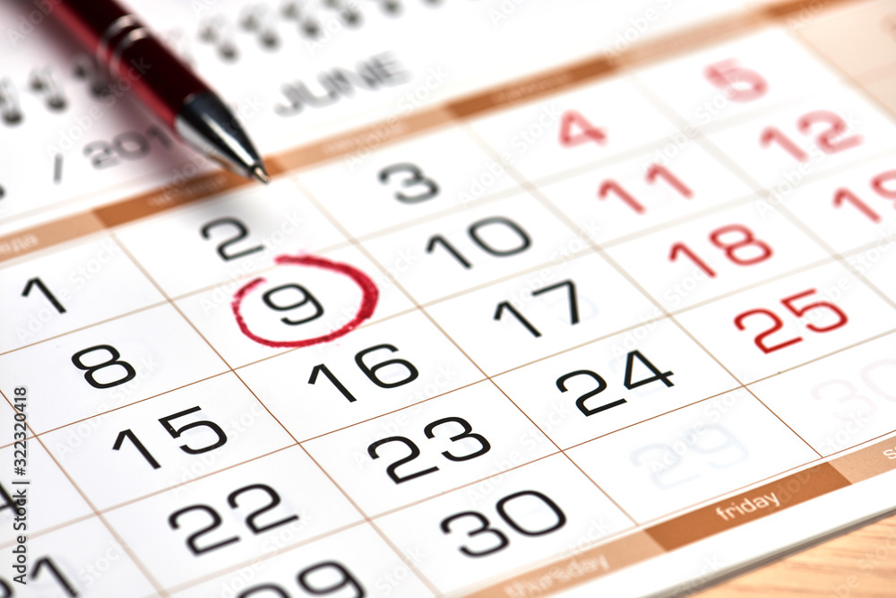 Red circle marked date on the month calendar Red circle marked date on the month calendar