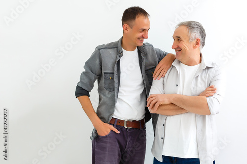 Senior Father With Adult Son isolated on white background