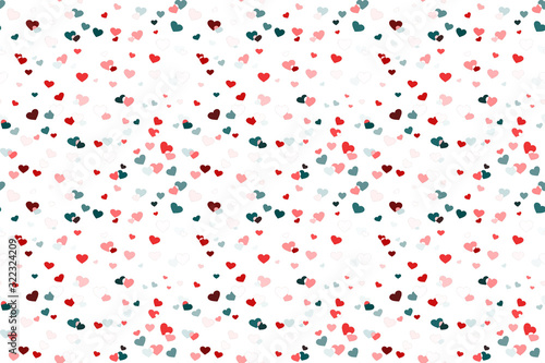 Abstract seamless background with multi-colored hearts on white canvas. Romantic pattern for Valentine's day. Festival of random falling and spinning confetti.