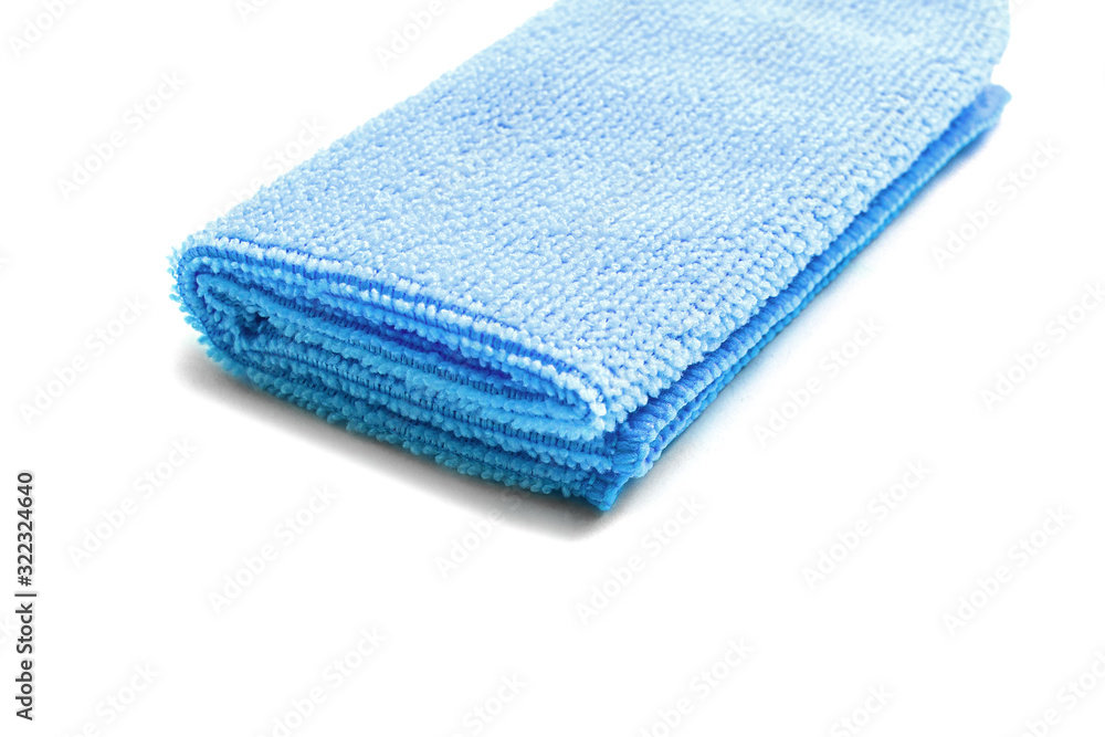 Blue universal microfiber cloth for cleaning objects and surfaces on a white background. Cleaning cloth, napkin. Four folded towel. Blue universal microfiber cloth for cleaning objects and surfaces on a white background. Cleaning cloth, napkin. Four folded towel.