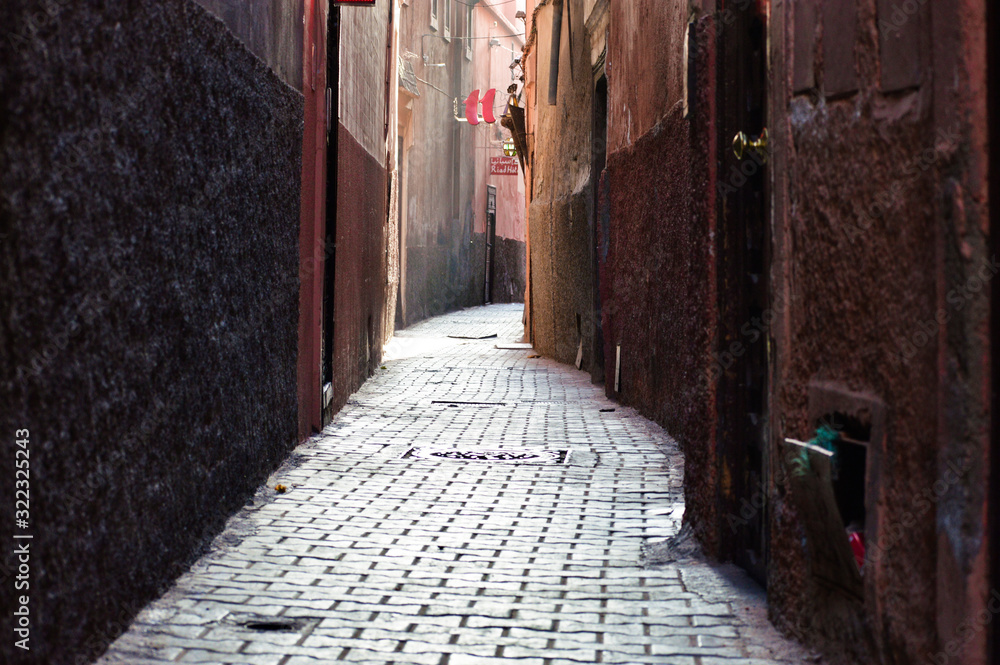 Empty, narrow and cold streets of Medina in Marrakech, Morocco