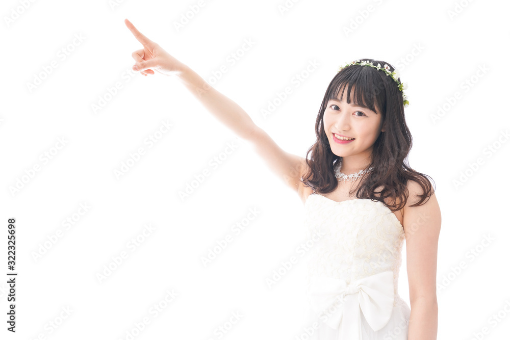 将来を指差すドレス姿の花嫁 将来を指差すドレス姿の花嫁
