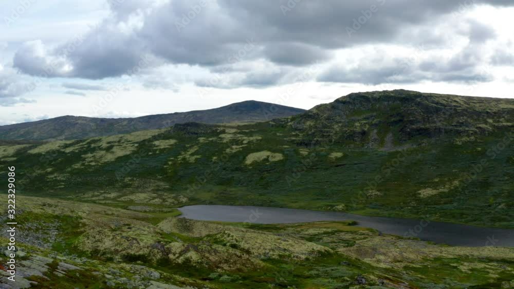 Scenic View From Above of Mountain Range and Lake in Norway Scenic View From Above of Mountain Range and Lake in Norway