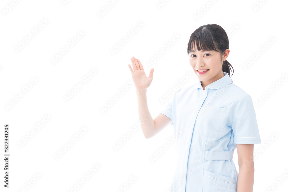 指をさす若い看護師