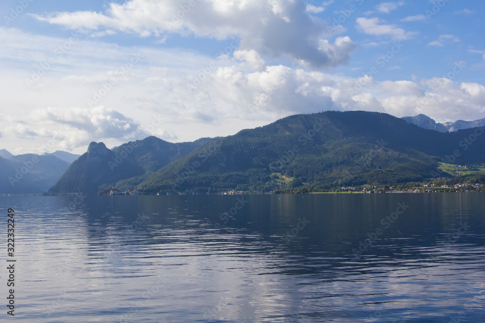 Background view of the beautiful mountains, forested, on the shores of the lake Traunsee in the vicinity of Gmunden, Austria, Europe