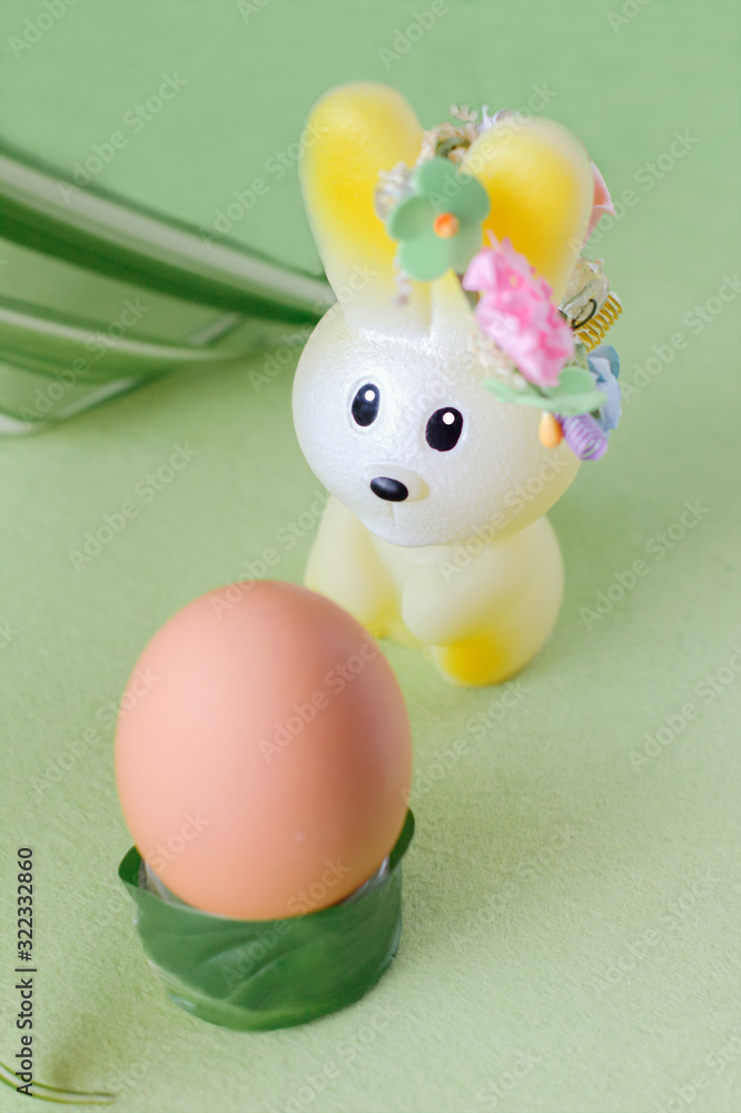 easter celebration concept. toy bunny and egg on grass. happy easter and spring project. easter celebration concept. toy bunny and egg on grass. happy easter and spring project.