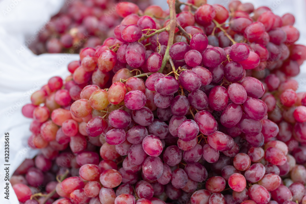 Red grapes background.
