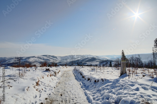 On a mountain trail in winter