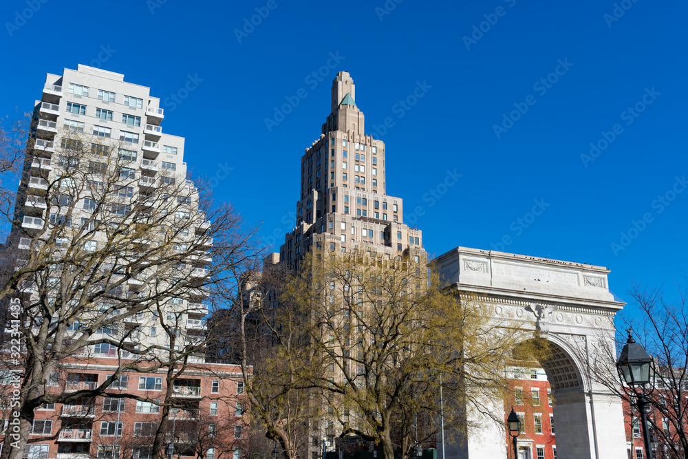 The Arch at Washington Square Park  in Greenwich Village of New York City surrounded by Skyscrapers