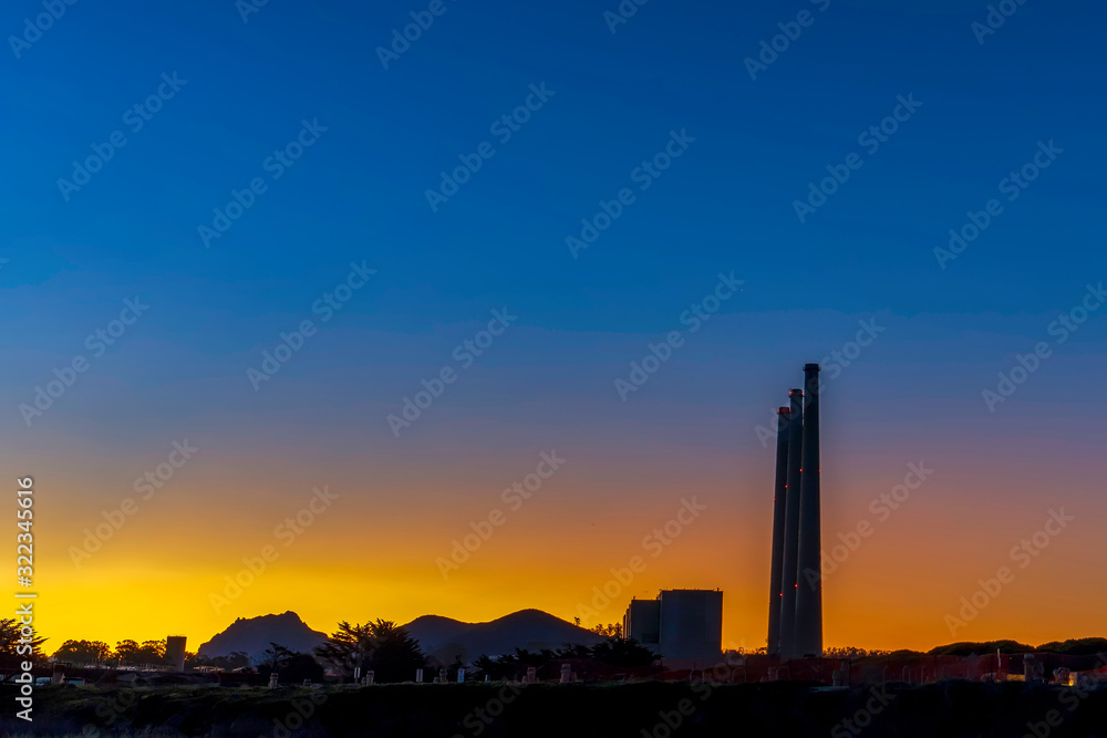 Silhouetted Tower, Buildings, at Sunset Sunrise Silhouetted Tower, Buildings, at Sunset Sunrise