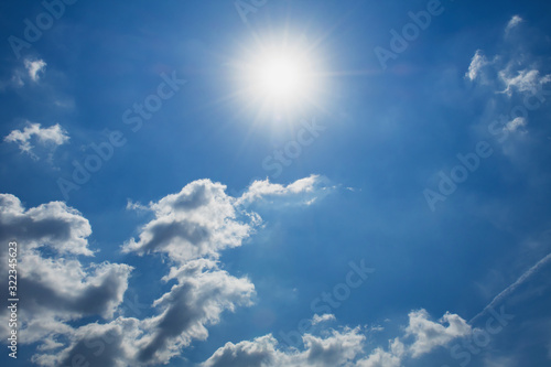 beuatiful blue sky with white cloud and sunshine background