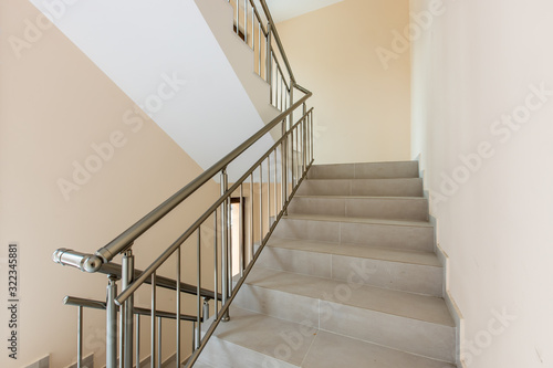 Fototapete Modern stair case between floors
