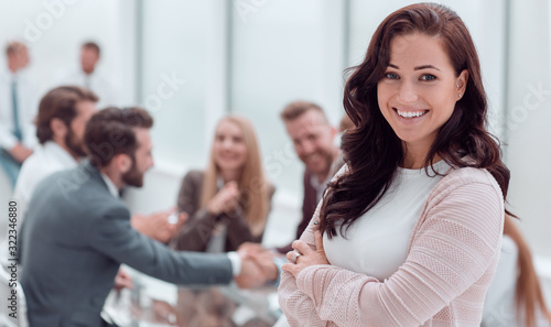 close up. smiling young business woman standing in office