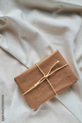 Gift package wrapped in jute paper