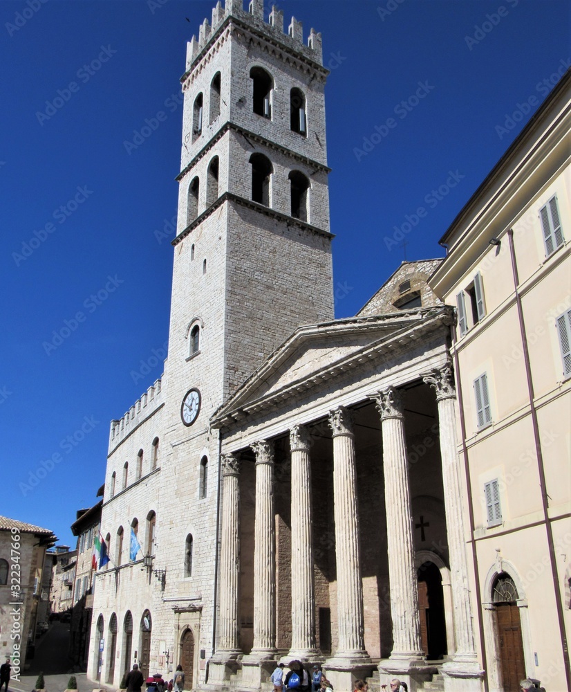 Obraz premium View of the Temple of Minerva located in Assisi, Italy on a sunny day 