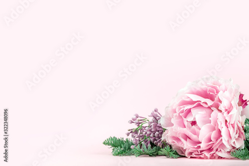 Fototapeta Naklejka Na Ścianę i Meble -  Very beautiful bouquet of flowers from peonies decorated with coniferous branches, winter-spring plants close-up. Holiday concept. Flowers for Mother's Day. Copy space.