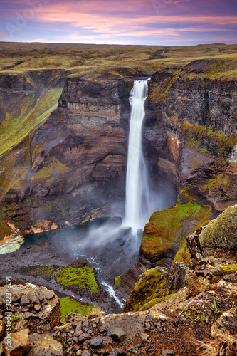 Amazing panoramic view of Haifoss waterfall on the Fossa river near the volcano Hekla  the second highest waterfall in Iceland  122 meters high  Scandinavia  Europe. Travel concept background..